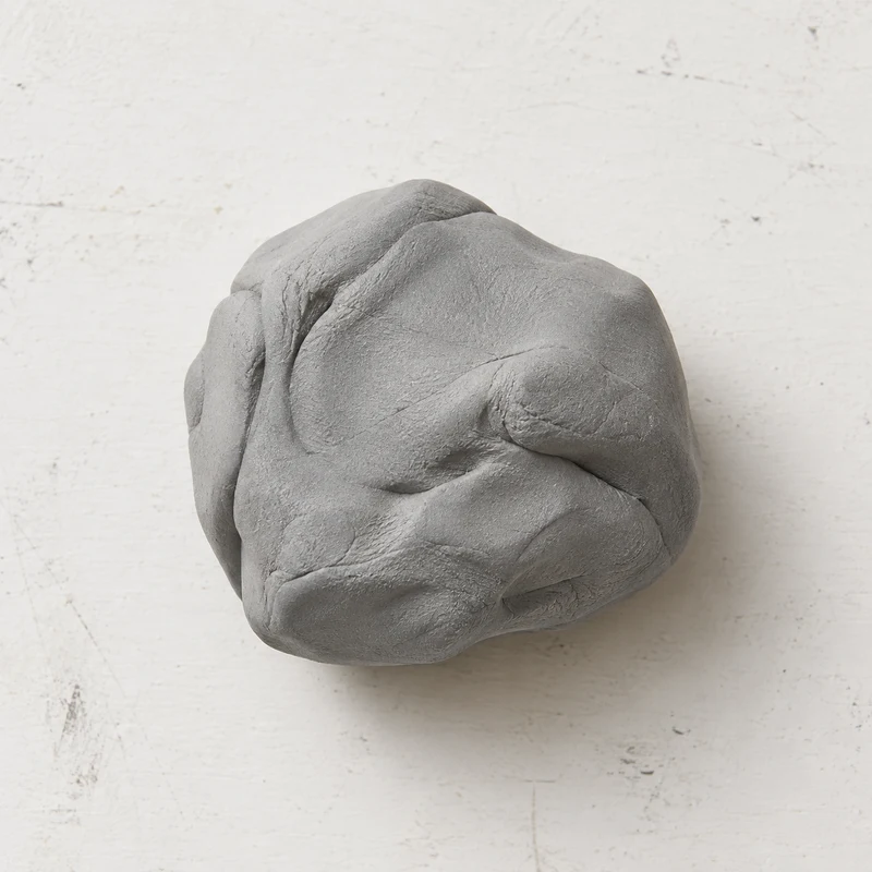 Kneaded eraser on a lightly marked white studio table