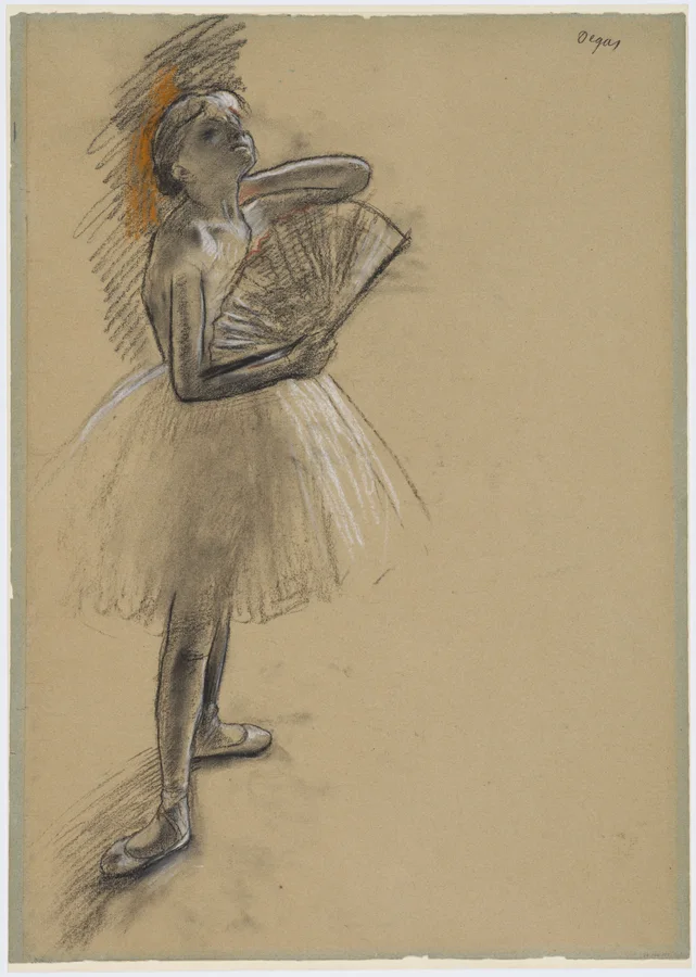 A standing ballet dancer holding an open fan.