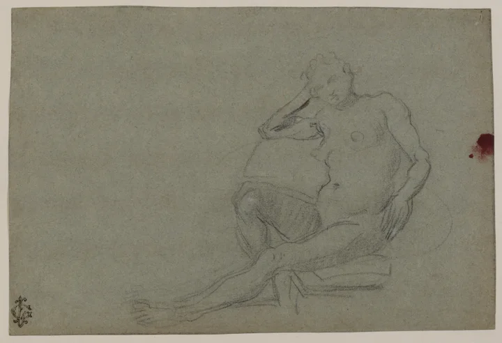 A seated female figure with extended legs on blue paper.