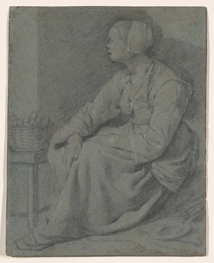 A seated woman beside a basket, drawn on blue paper.